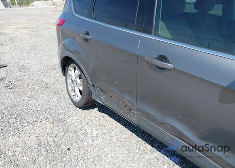 2014 Ford Escape Titanium из США, поврежденный, VIN 1FMCU0J9XEUA53301